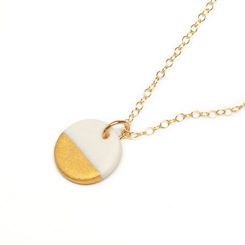 small circle necklace in matte gold