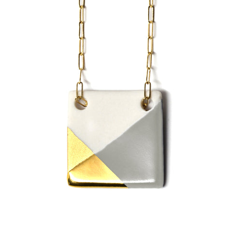 gray and gold square necklace